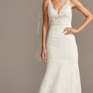 Size 6 wedding dress worn once. Very little alterations. Professionally cleaned.